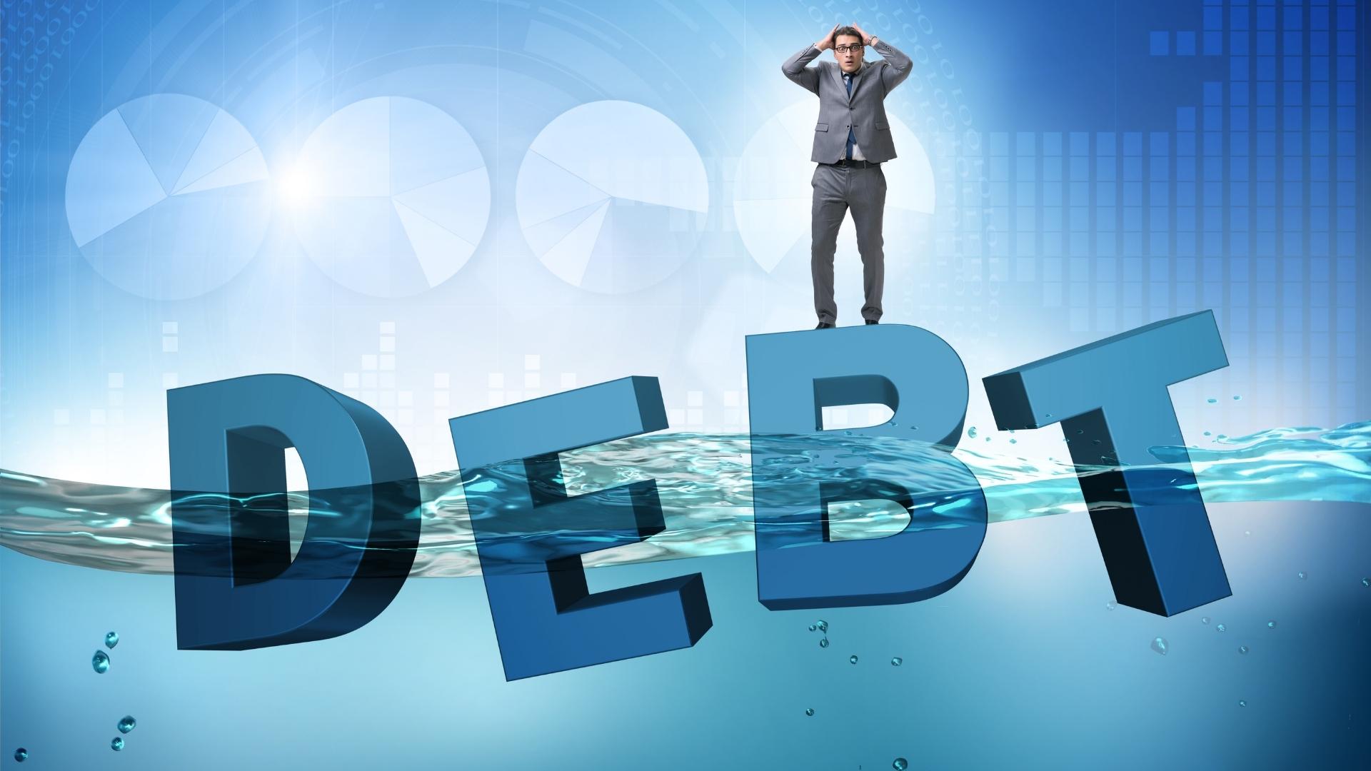 Picture of man swimming in debt